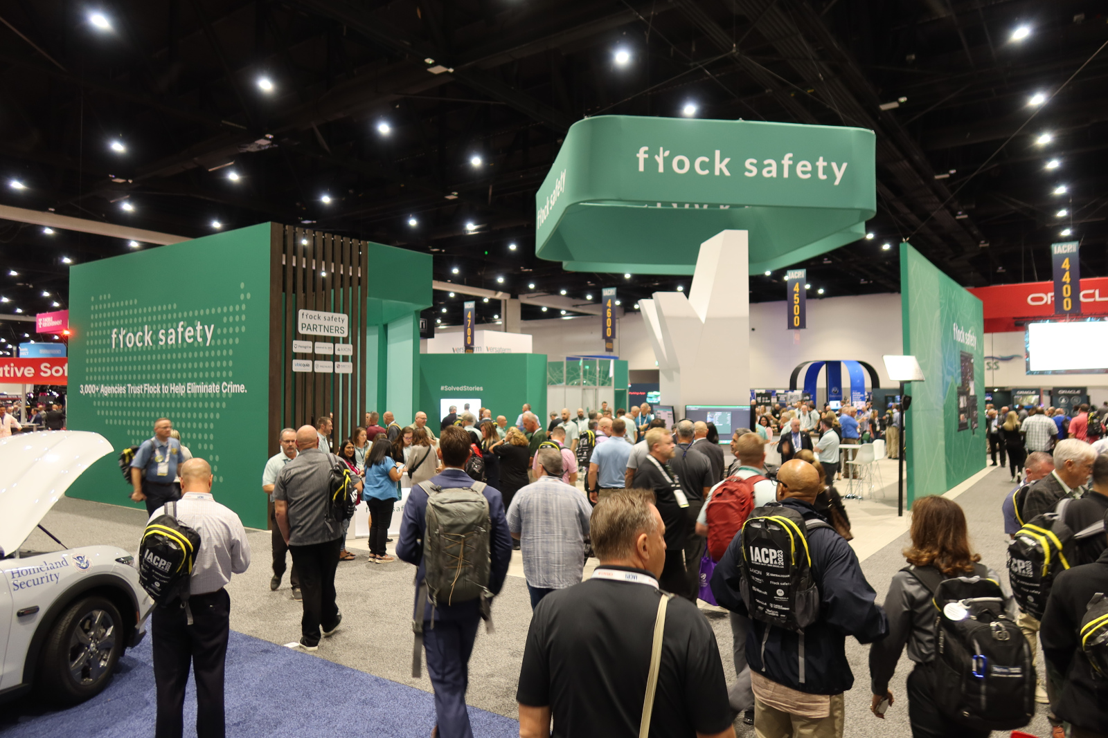 A crowd around the Flock Safety set-up at a police conference. A crowd around the Flock Safety set-up at a police conference.