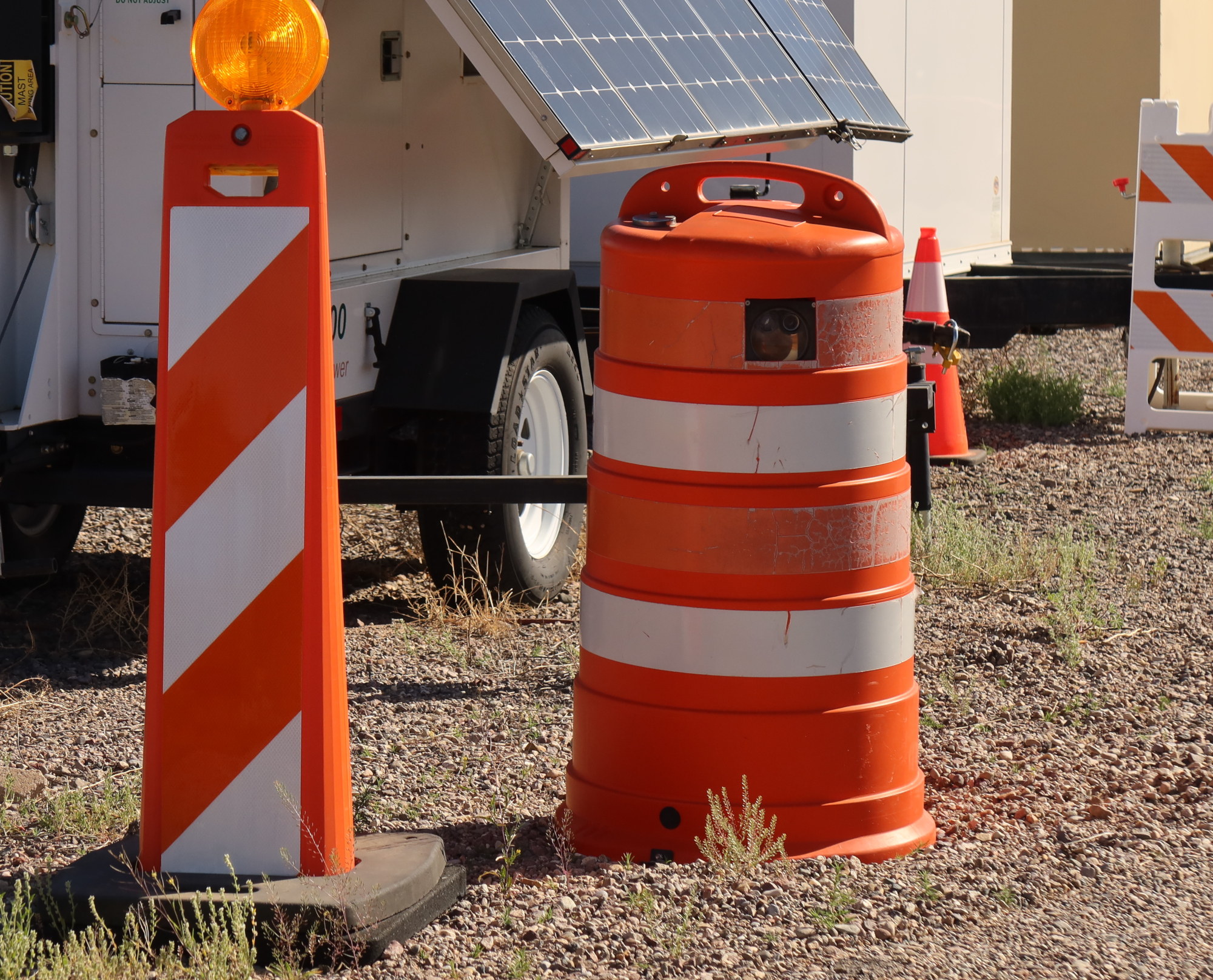 A camera hidden inside an orange traffic barrel A camera hidden inside an orange traffic barrel